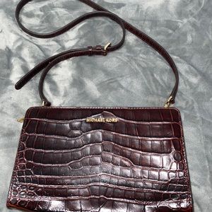 Authentic Michael Kors cross body bag $65